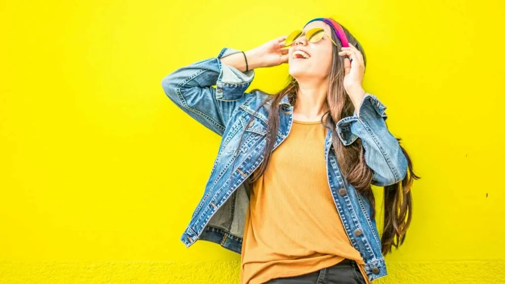 Lady enjoying music on her headphone