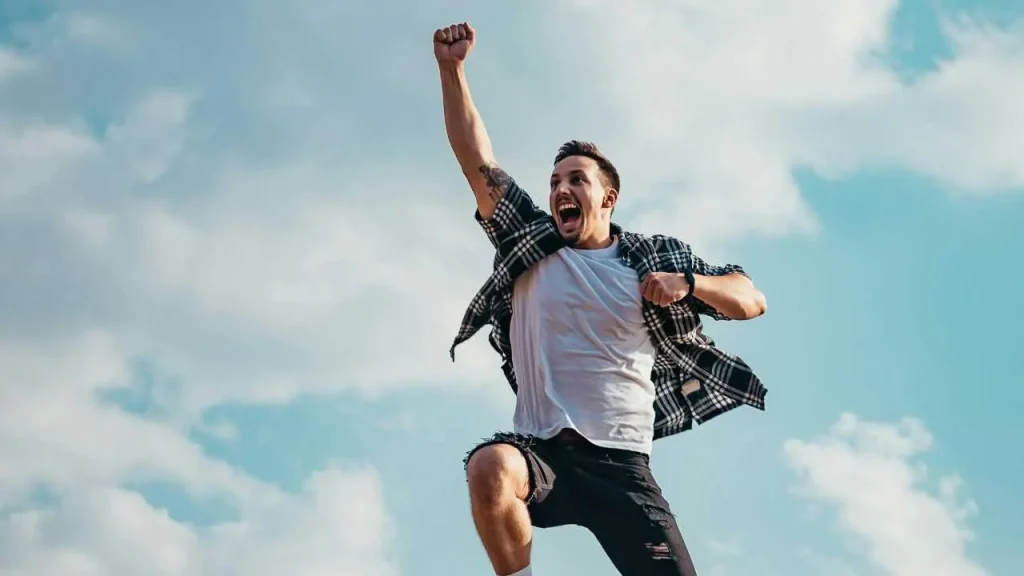 Man jumping up into the air with excitment