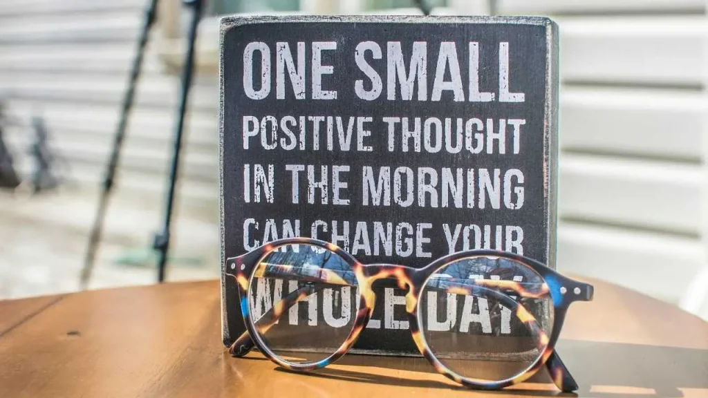 Good morning positive energy quotes on a notebook