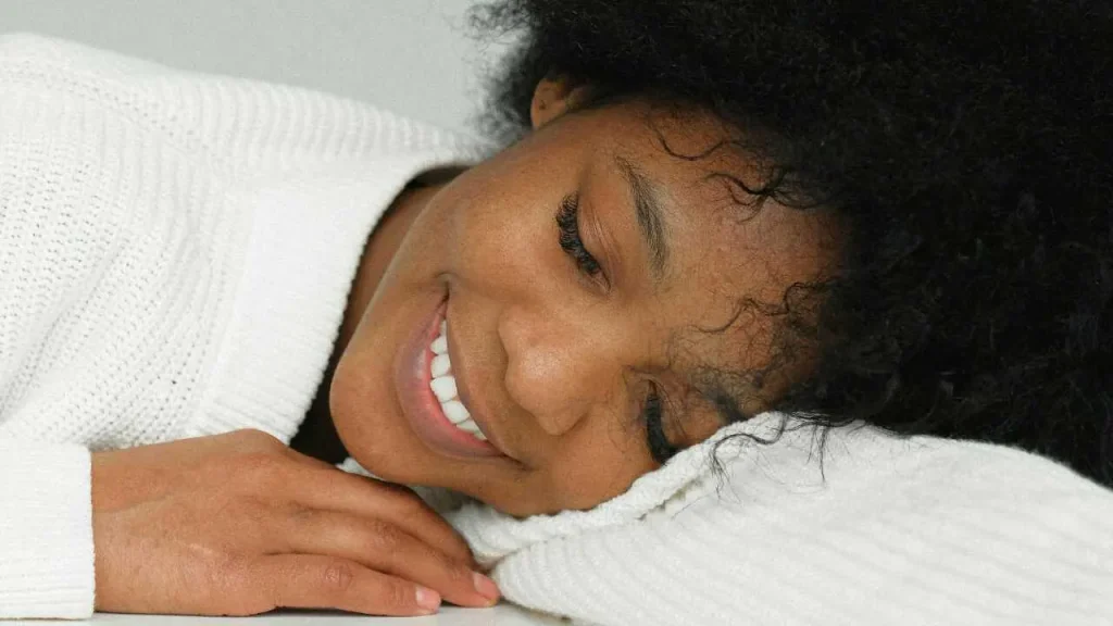 lady smiling while lying down
