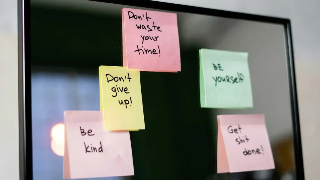 Positive energy quotes on a notebook