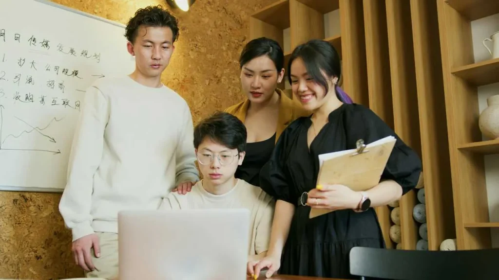 Group of employees collaborating on a task