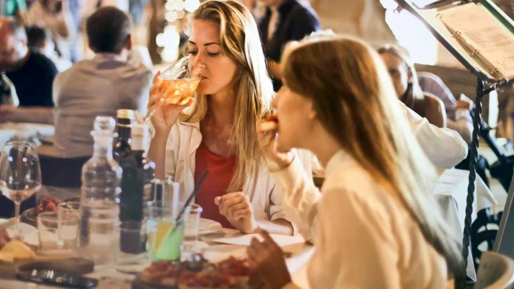 Two ladies eating slowly 