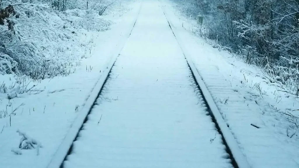 A rail track covered by snow