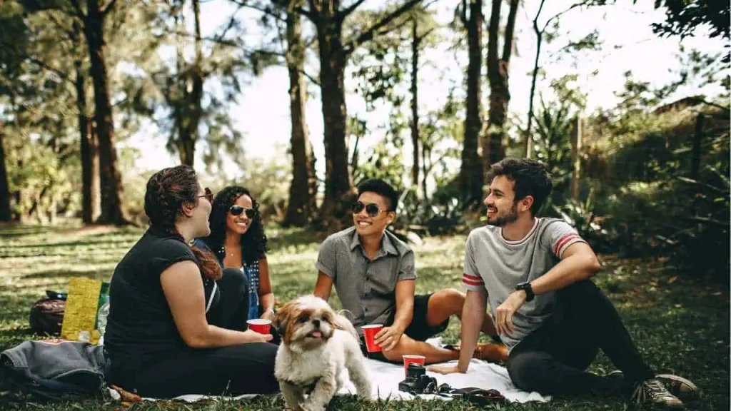 A group of friends hanging out in an open space representing how to forgive