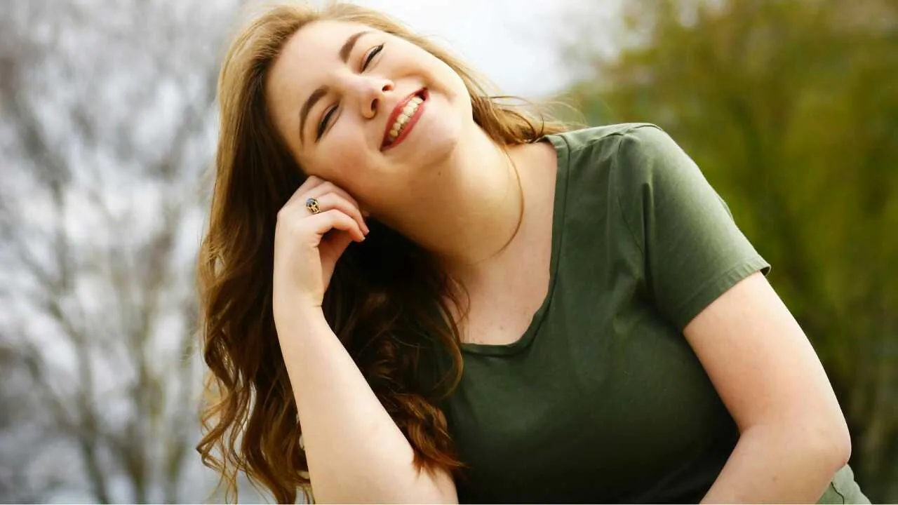 Practical Ways to Practice Self Love Daily A lady smiling showcasing ways to practice self love daily
