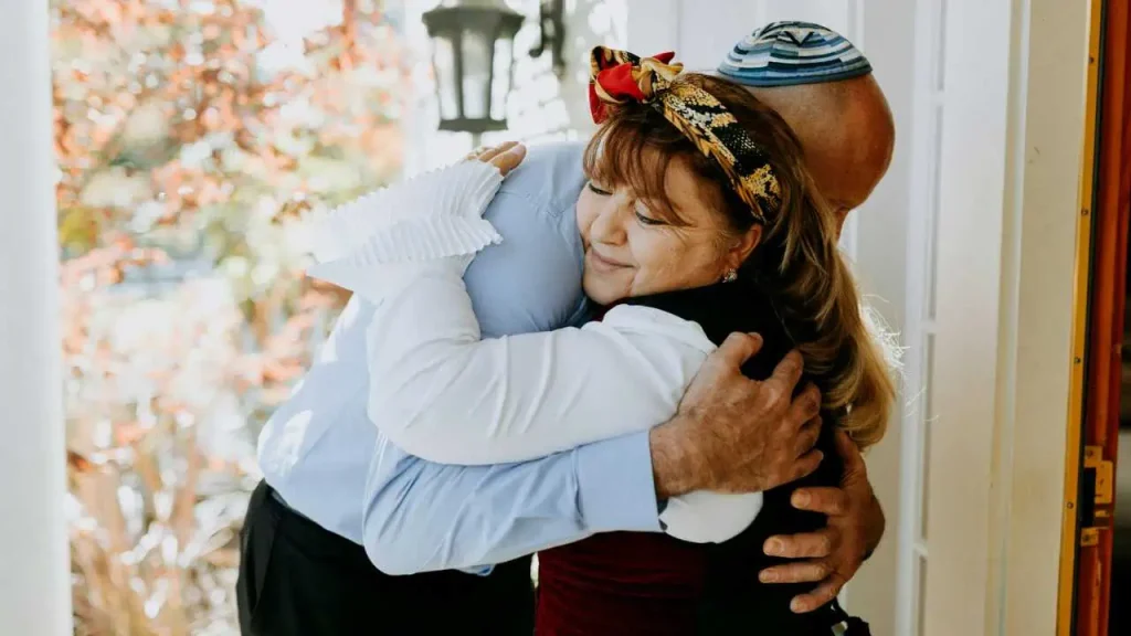 An emotional embrace between a man and a woman representing how to overcome childhood emotional neglect