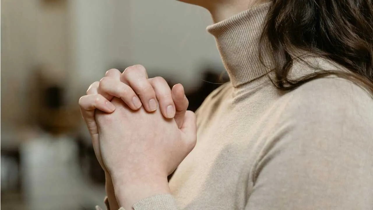 Biblical quotes on strength Hands folded in a praying position depicting biblical quotes on strength