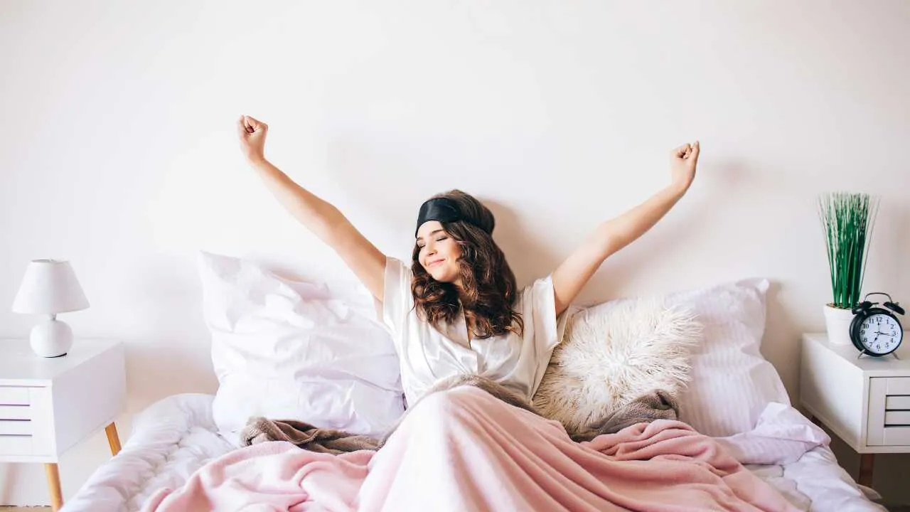 Inspired good morning quotes A lady waking up depicting inspired good morning quotes