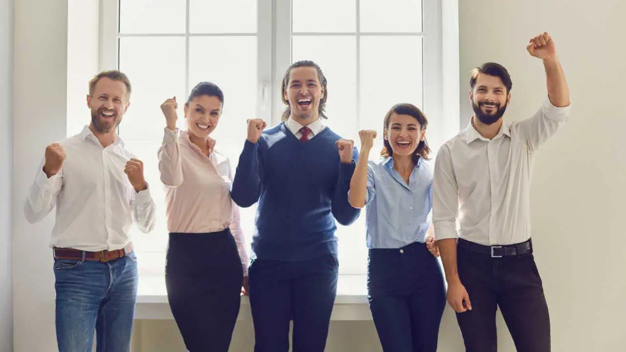 A group of happy persons depicting best life quotes to live by