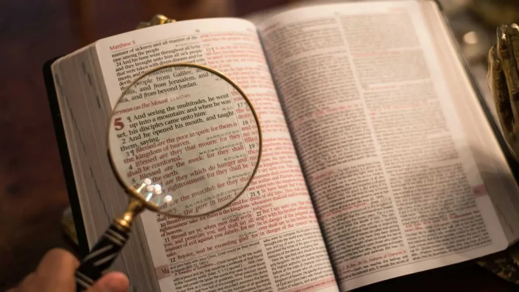 An open Bible depicting more than a conqueror verses