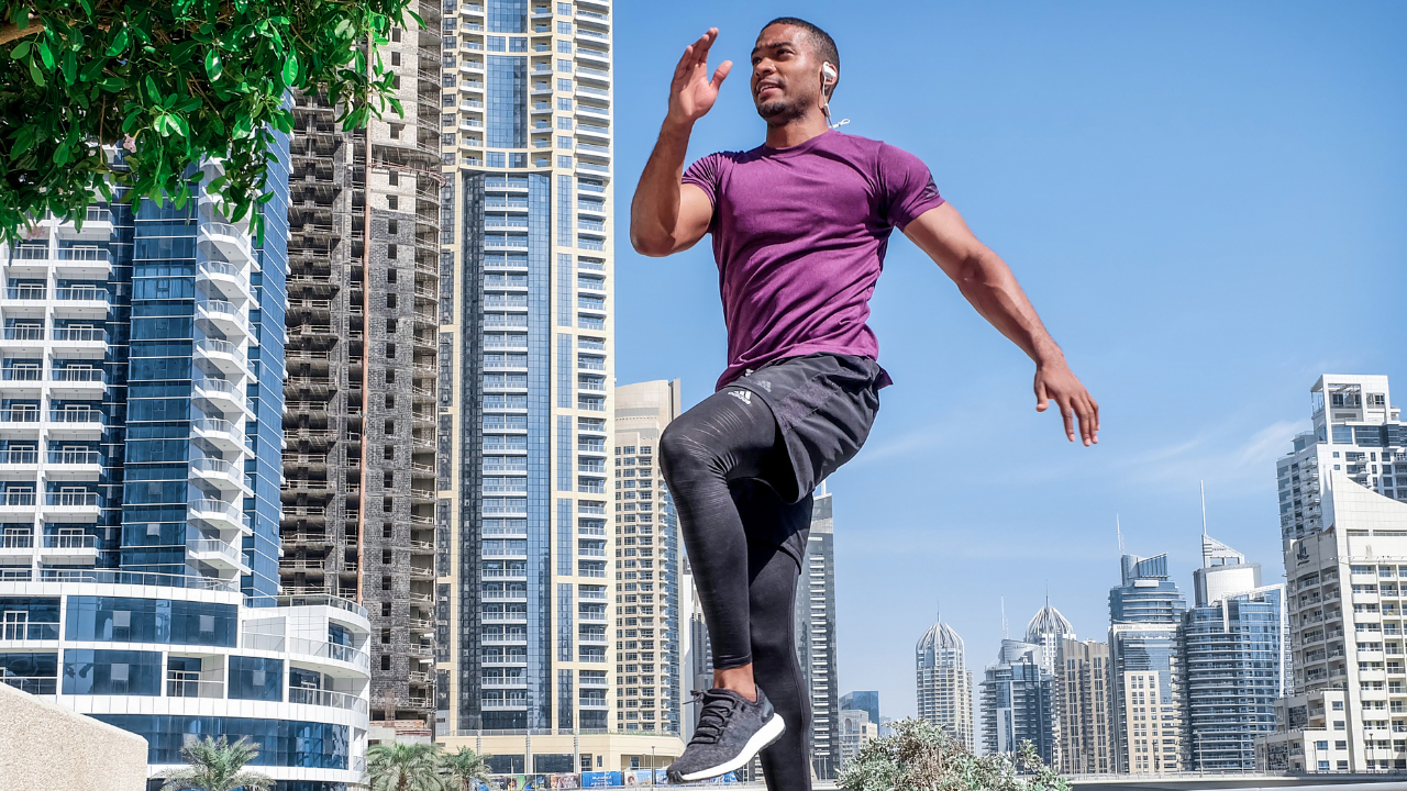 Ways to boost motivation A young man jogging depicting ways to boost motivation