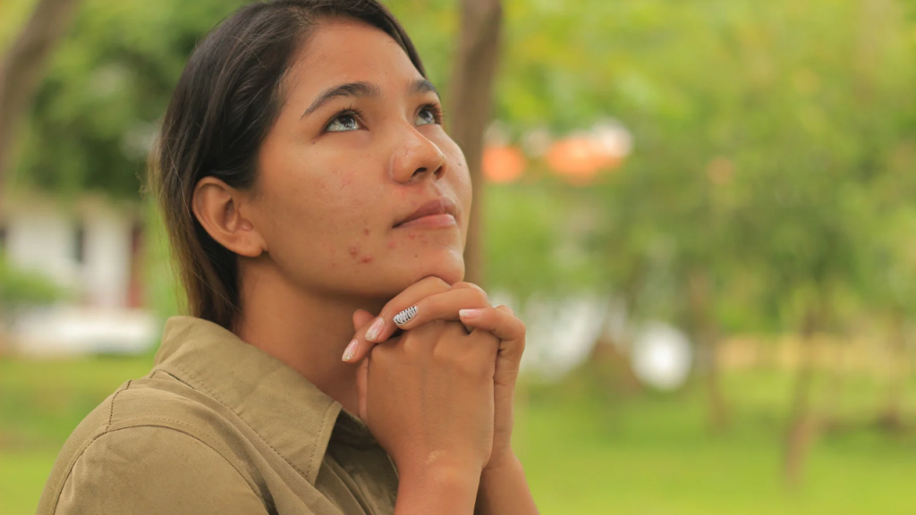 A lady starring with hope