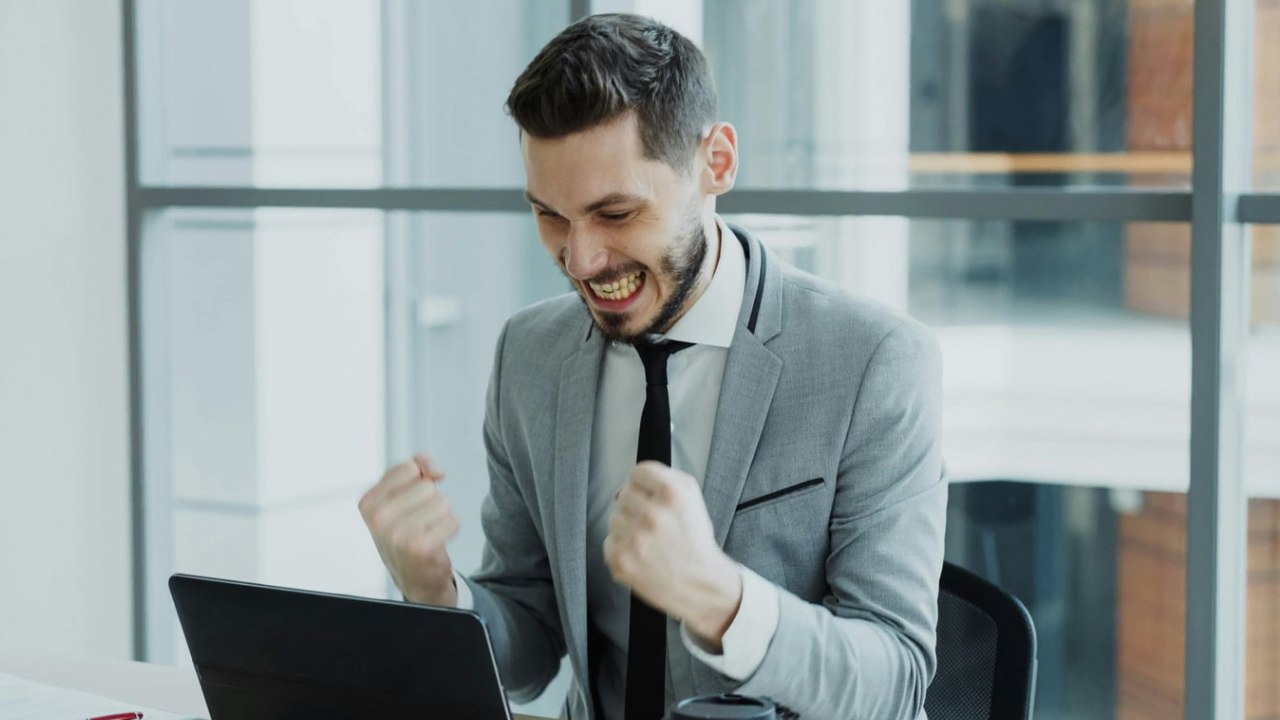 An excited man depicting Effective Goal Setting Strategies for Success